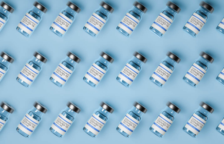 Blog Main Image - 3D Vaccine Bottles Arranged Grid Blue