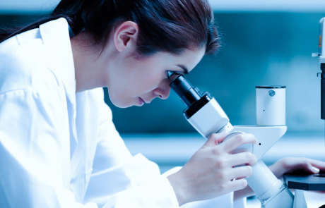 Blog Main Image - Researcher Woman Using Microscope Lab