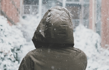 Blog Main Image - Woman Facing Snowy City