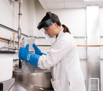 Scientist moving samples in BRI's biorepositories